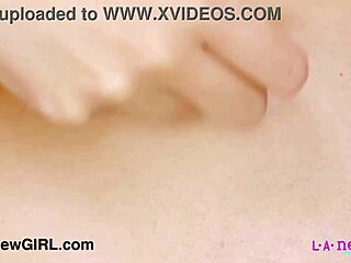 sophisticated brunette model poses during photoshoot to display her figure