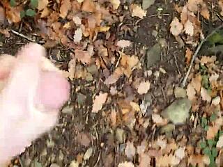 Forest masturbation session happens outdoors in nature with solo focus.