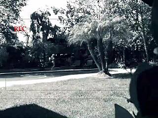 aubrey adams enjoys backyard fun while a peeping tom watches her