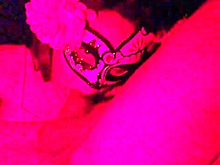 Why is she masked in red light while sucking that cock?