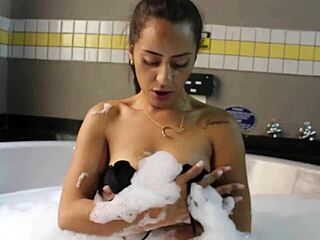 brunette sandy cortez bends over for doggystyle pounding in bathtub session