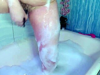 She's a pornstar fresh from bath, no makeup on, but dildo deep in wet pussy as work kicks off suddenly.