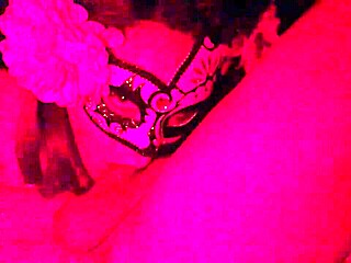 Why is she masked in red light while sucking that cock?