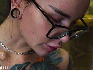 Why does busty beauty Eva Gold cover big fake tits in body paint for erotic shower show?