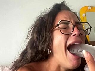 very horny tattooed brunette with fake tits and glasses masturbates to orgasm with dildo and vibrator in lingerie compilation