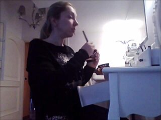 Amateur with big tits goes topless in hidden cam footage. She burps while doing makeup in voyeur reality style.