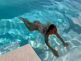 gorgeous monika fox dives into the pool naked, her big tits and pierced nipples shining under the sun in this adorable solo scene