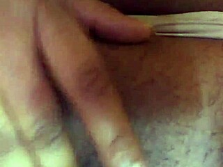 Chinese girl plays with her wet clit and pussy