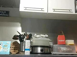 Redhead girlfriend dildos herself wildly on the counter