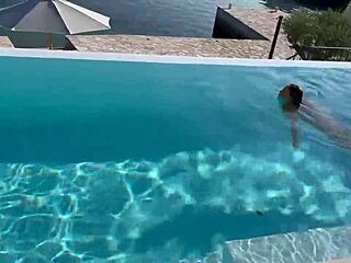 gorgeous monika fox dives into the pool naked, her big tits and pierced nipples shining under the sun in this adorable solo scene