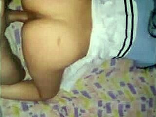 Beautiful tall Latina with big ass and lingerie strips while dancing in bedroom.