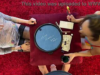 Two horny sluts challenge a guy in dice game to make him cum first.