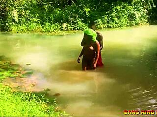 Intense hardcore pounding of African whore with big dick by the stream