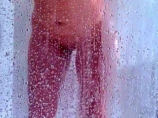 watch her big ass and tits bounce wildly in this explicit shower scene with shaved pussy action!