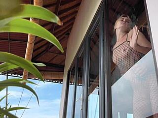 I felt thrilled recording a cute blonde babe in fishnets and lingerie. She looked pretty bending over beautifully.