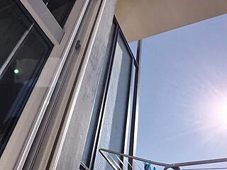 latina fetish girl masturbates pussy and ass on balcony without panties showing off her hot body in public exhibition