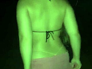 Girl in micro panties on beach