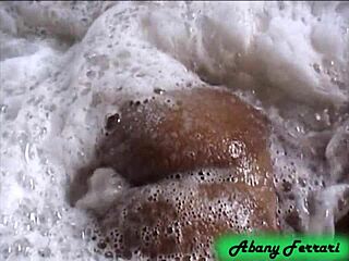 this portuguese brunette is such a naughty one showing off outdoors at the bar and naked in the bathtub.