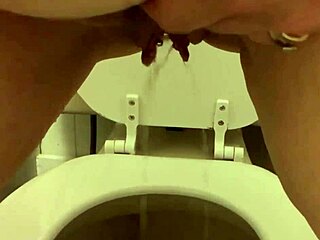 my pretty pierced area down there while peeing in the bathroom as a solo moment