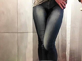 Desperate pee floods my jeans and pink high heels during intense moment