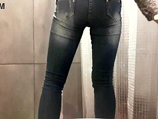 Desperate pee floods my jeans and pink high heels during intense moment