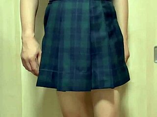 forced to wear smelly school swimsuit from boys' mess, inserting shiny plug in the costume for subtle fetish play