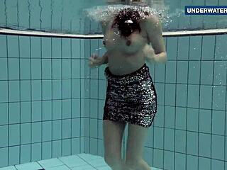 i love flashing my bright tits underwater at the beach to make everyone feel excited and horny