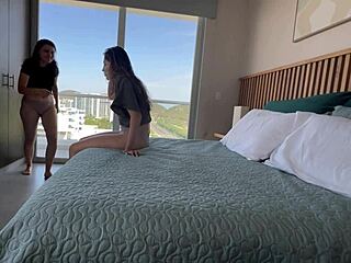 Two girls passionate about sex record themselves in their hotel room. They enjoy fingering and scissoring in homemade video.