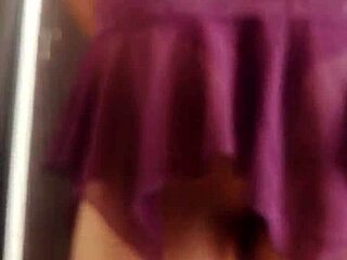 Transvestite displays outfits in a detailed modeling sequence