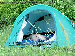 On the beach, this nudist milf Al B Ta relaxed in her tent during a sunny outdoor day.