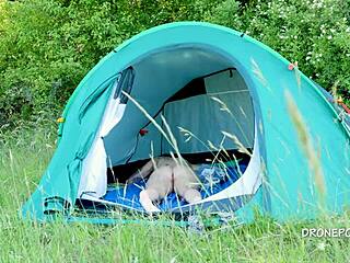 On the beach, this nudist milf Al B Ta relaxed in her tent during a sunny outdoor day.