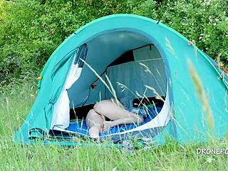 On the beach, this nudist milf Al B Ta relaxed in her tent during a sunny outdoor day.