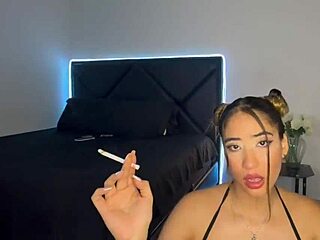 little blonde smokes cig while deepthroating roommate's huge cock