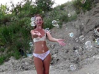 SOAP BUBBLES DRIP ON MATURE CROSSDRESSER'S SEE-THROUGH BIKINI