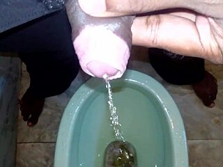 Black boy pisses on man urinating pee stream in wild outdoor pee play!