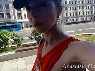 Chubby exhibitionist flashes shaved pussy hanging laundry on balcony