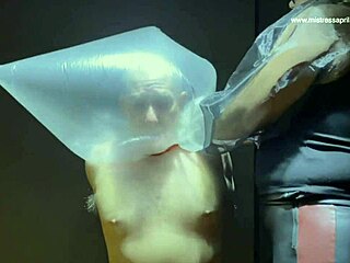 mistress april straps on for brutal femdom prison threesome interrogation