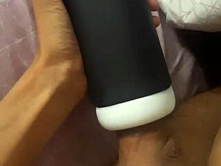 Guy cums deep inside tight sex toy gripping his throbbing cock