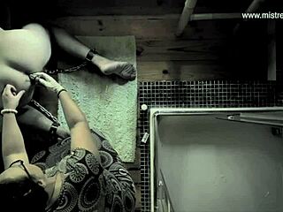 mistress april straps on for brutal femdom prison threesome interrogation