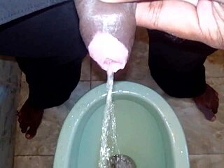 Black boy pisses on man urinating pee stream in wild outdoor pee play!