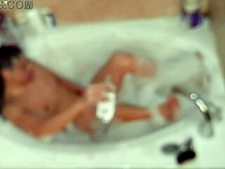 solo boy bubbles up naked in bath playing with feet fetish