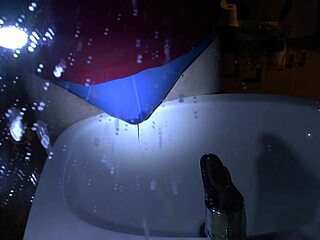 Blue Underpants Pee Soaking Over the Sink