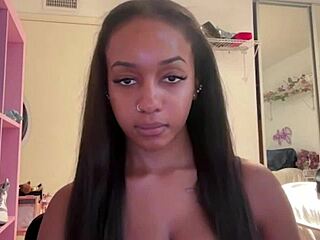 What Secrets Lie Behind Lily Starfire's Oiled Ebony Curves?