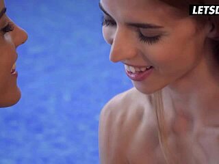 Carolina Abril and Emelie Crystal finger and lick shaved pussies poolside
