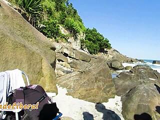 hey check this beach milf in microbikini sucking stranger cock publicly!