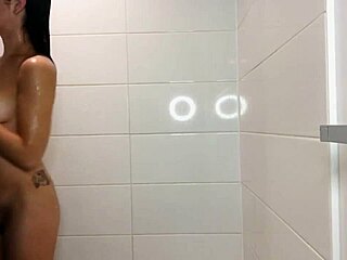 tiny latina nadia angel shaves pussy in steamy shower lotion rub