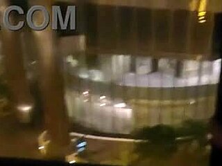 teasing my clit by the hotel window for all to see