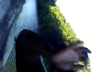 Bent over interracial blowjob in public outdoors