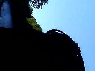 Bent over interracial blowjob in public outdoors