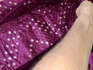 Bro pulls sali blouse on bed lehenga